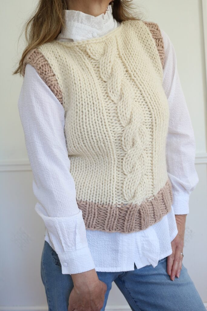 woman wearing cable knit vest