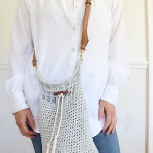 Crochet Bucket Bag Pattern - wearing cross body