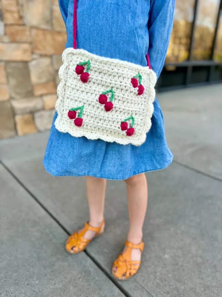 girl wearing crochet satchel bag