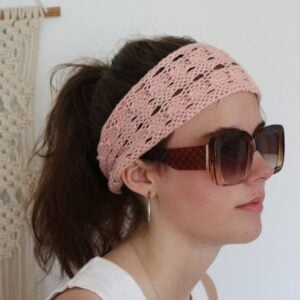 woman wearing pink lace knit headband