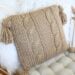 Cable Pillow Cover Knit Pattern - on chair with tufted pillow, 2 faux fur pillow, closeup 2