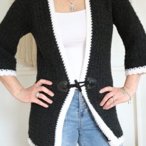woman wearing long crochet cardigan