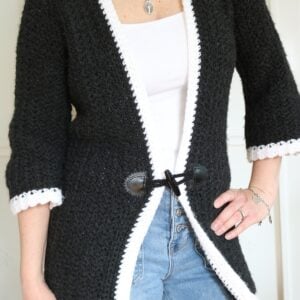 woman wearing long crochet cardigan