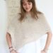 woman wearing knit cotton poncho for summer