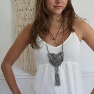 woman wearing crochet necklace