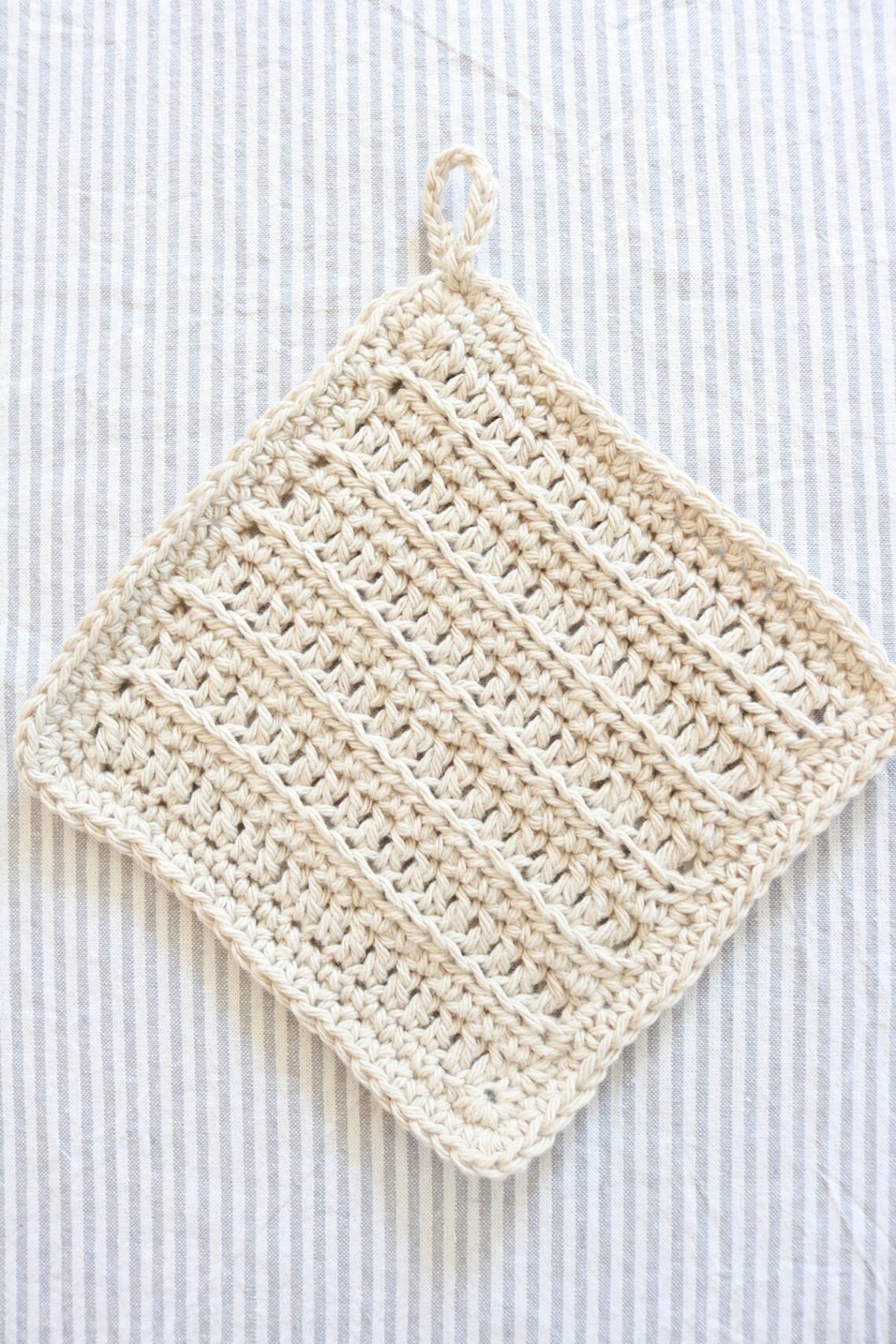 crochet dish cloth on table