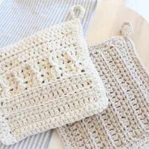crochet cotton dish cloths on table with wood board