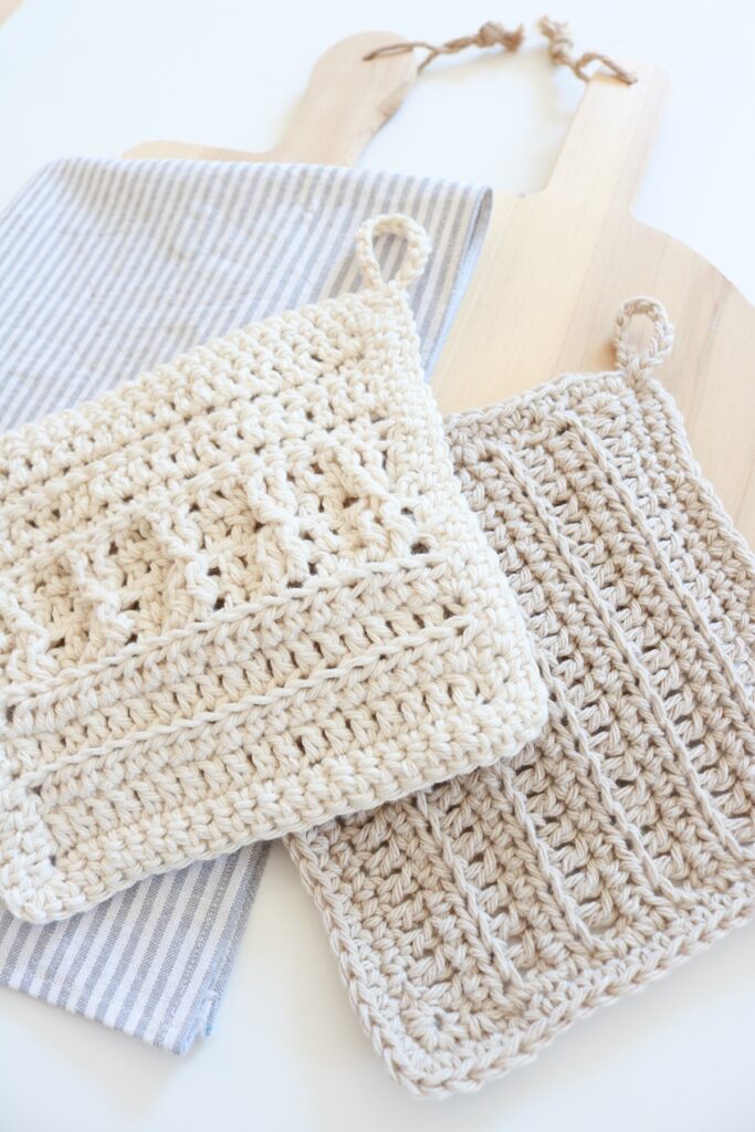 crochet cotton dish cloths on table with wood board