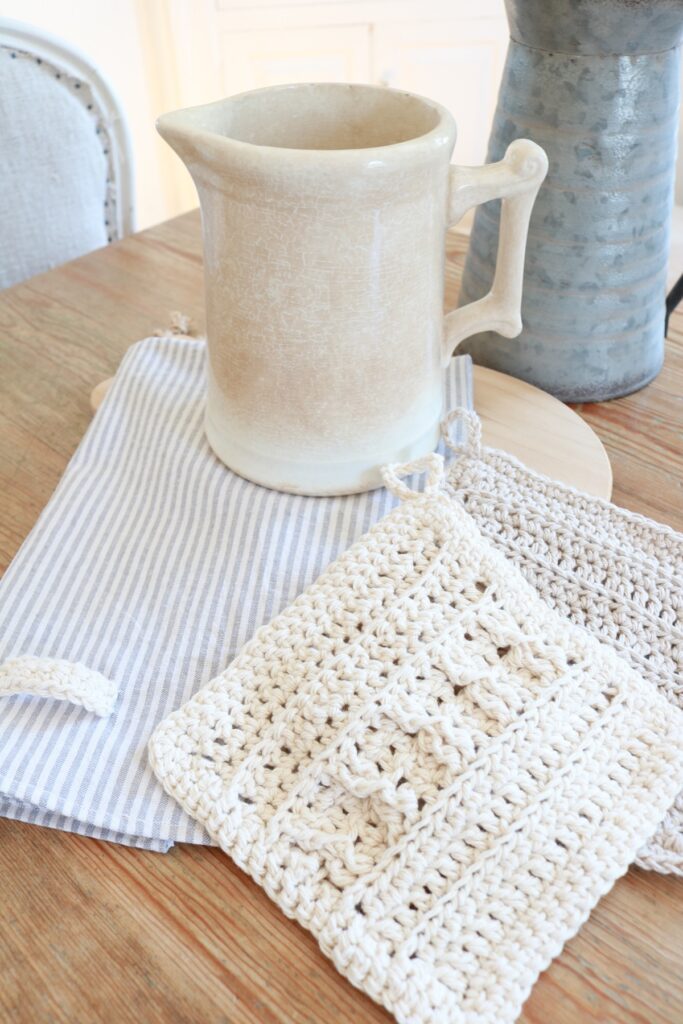 crochet cotton dish cloths on table with pitchers