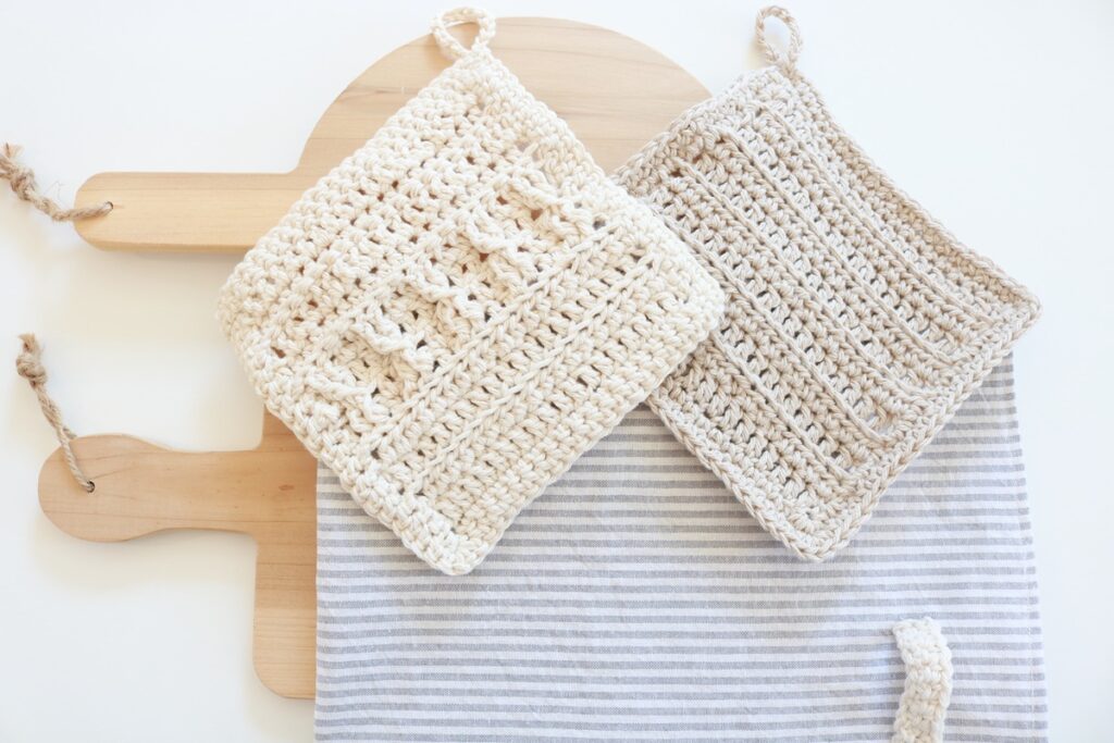 crochet cotton dish cloths on table with wood board