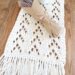 knit table runner on table