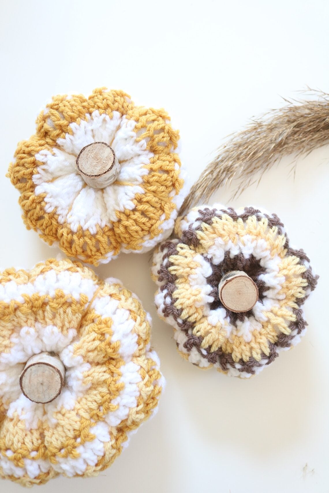 Crochet Striped Pumpkins, flatlay with wheat 2 1200px