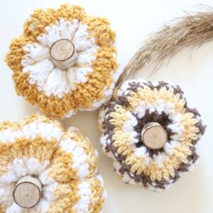 Crochet Striped Pumpkins, flatlay with wheat 2 1200px