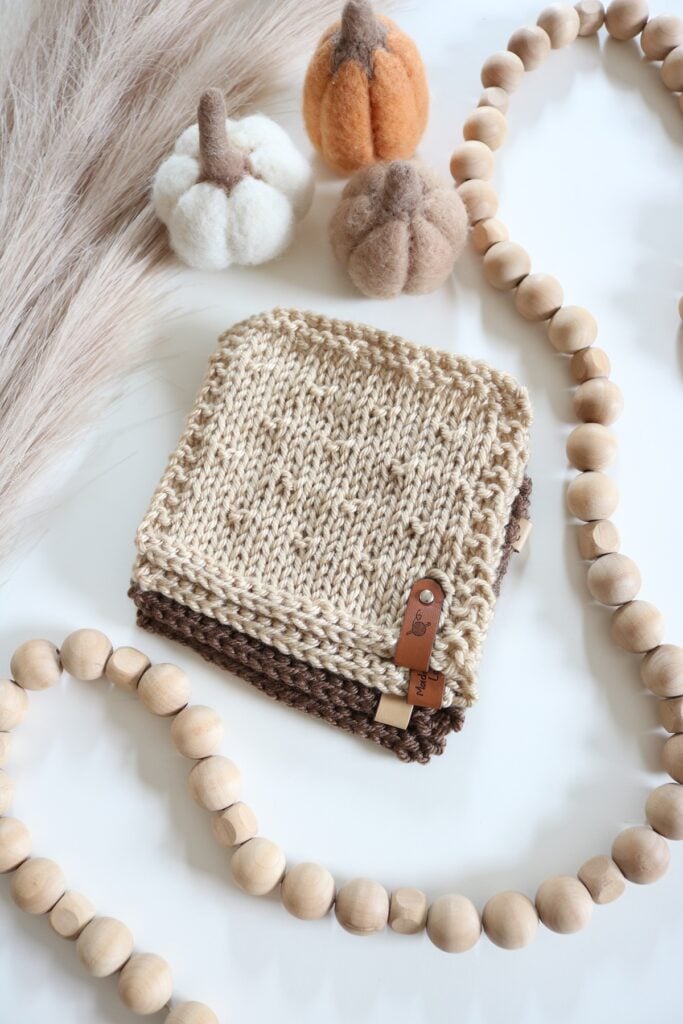 Textured Coasters Knit Pattern - flatlay, worsted yarn, with pampass and props